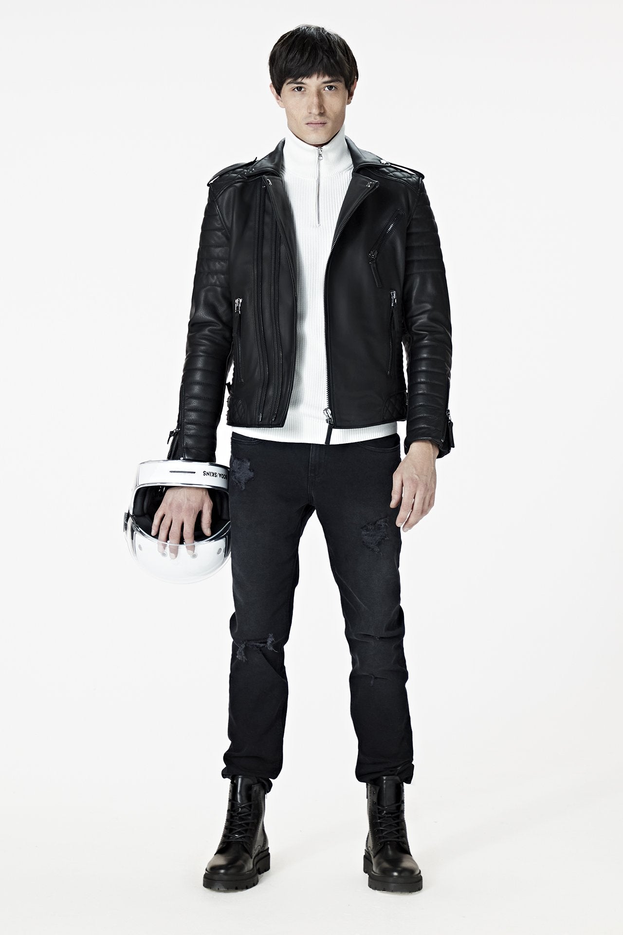 A male model wearing our Men's Black Leather Biker Jacket - Kay Michaels: biker protection from the BODA SKINS biker collection. Front facing.
