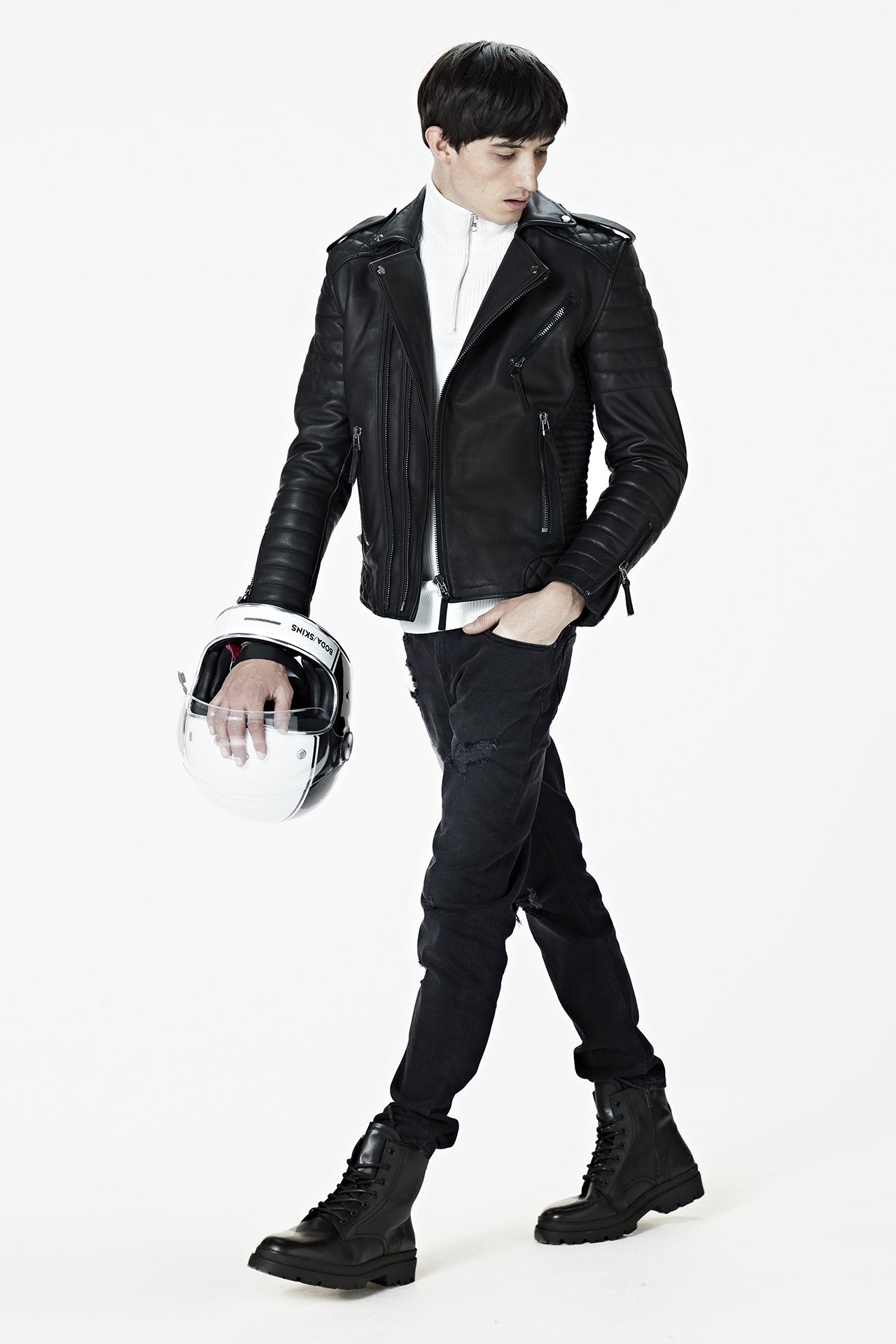 A male model wearing our Men's Black Leather Biker Jacket - Kay Michaels: biker protection from the BODA SKINS biker collection. walking
